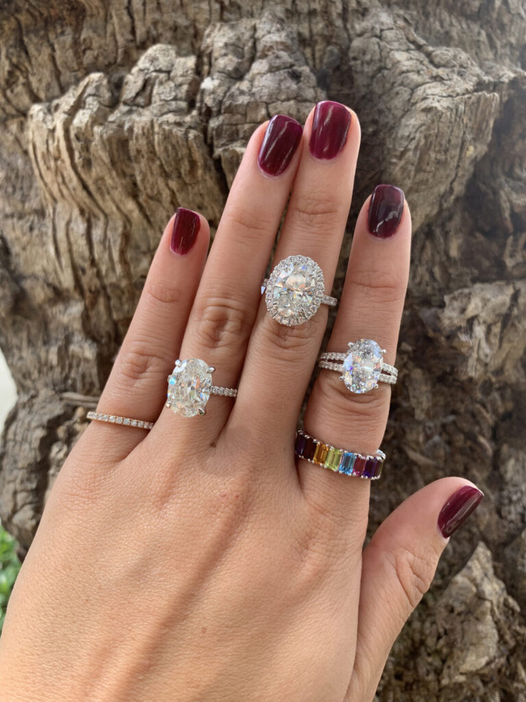 oval cut engagement ring with diamond band